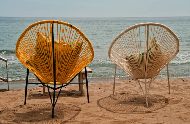 istock chill out armchairs with ocean in the background 1247066297