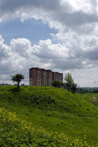 istock Residential building on the green hill 1247074953
