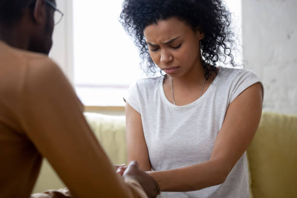 istock Upset African wife receive moral support from husband concept 1247084234