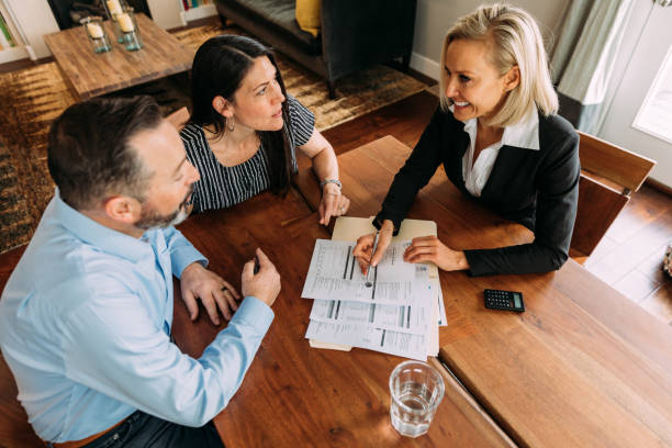 istock Financial Advisor Meeting with Couple 1247087027
