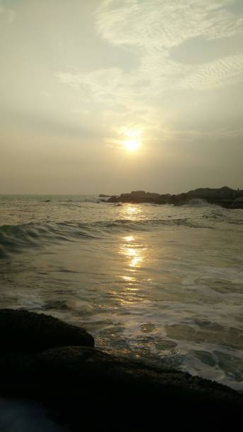istock The setting sun at kanyakumari. 1247093840