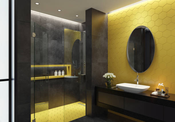 istock Modern black and yellow gold bathroom with hexagonal tiles 1247130786