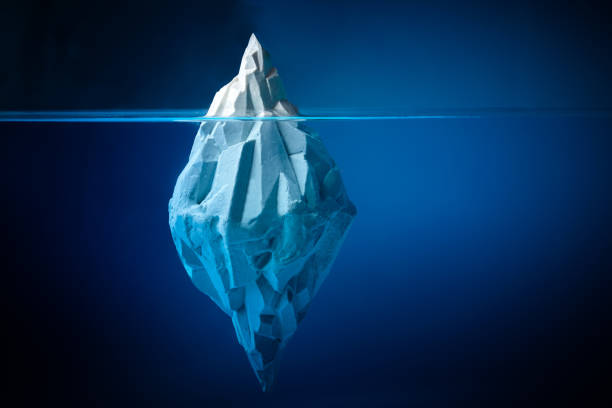 istock White iceberg on deep blue background. Environment concept. Winter concept. Ocean underwater background. 1247148472