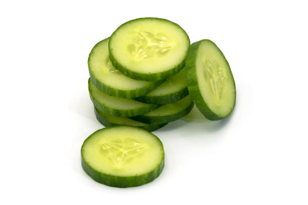 istock Fresh slice cucumber close-up on a white background 1247153144