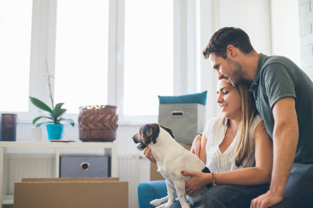 istock Young couple moving in into new apartment 1247166209