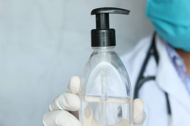 istock Doctor holding hand sanitizer with copy space 1247171592