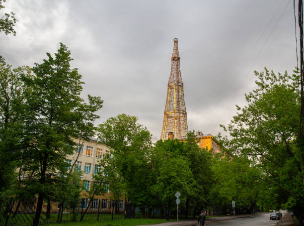 Shukhov Tower in Moscow in constructivism style in architecture ! Russia is  famous for constructivism  ( style in architecture and arts which born in Russia amazing sky at summer in Moscow , Russia.  Creation date 1920-1922