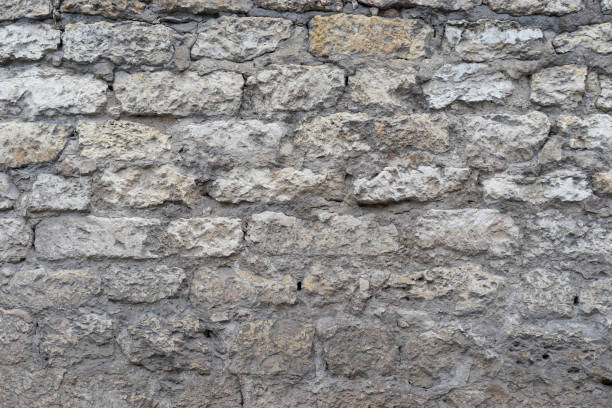 istock brick red wall. background of a old brick house. 1247216296