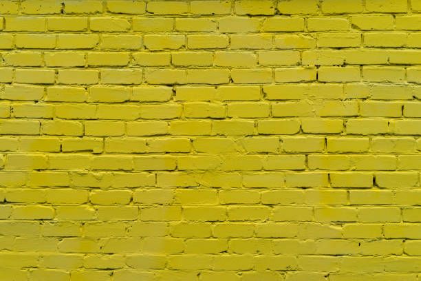 istock yellow brick red wall. background of a old brick house. 1247218953