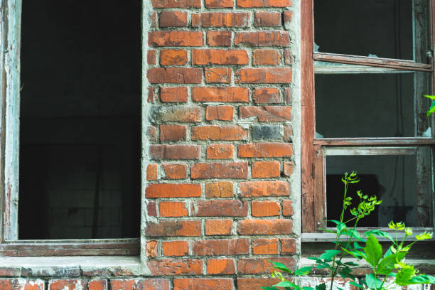 istock brick red wall. background of a old brick house. 1247221082