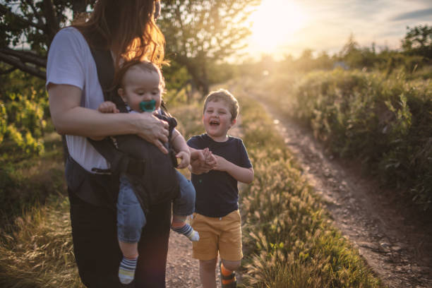 istock Active mother with her Boys outdoors in nature 1247227643