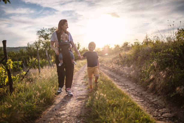 istock Active mother with her Boys outdoors in nature 1247235250