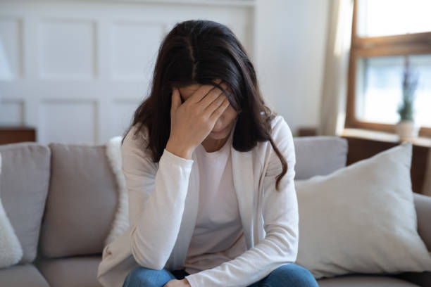 istock Upset young woman feel distressed at home 1247241371
