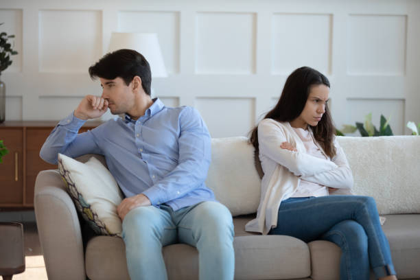 istock Unhappy couple avoid talking after family fight 1247241465