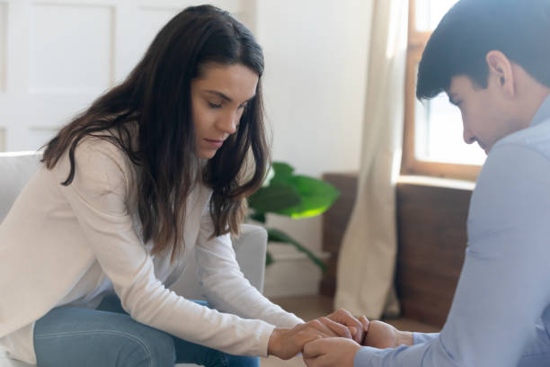 istock Sad young couple hold hands having family relationship problems 1247241523