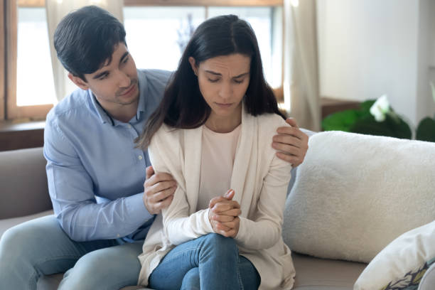 istock Young husband make peace with unhappy wife 1247241903