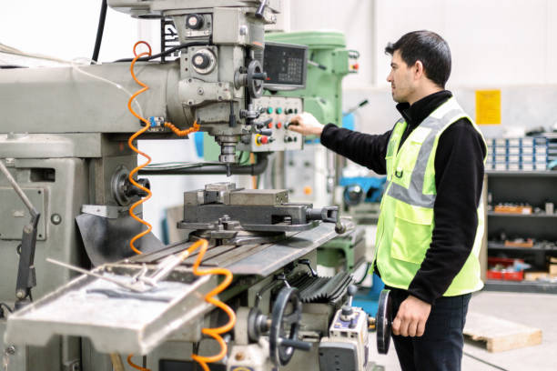 istock Turner worker working on drill bit in the factory 1247245615