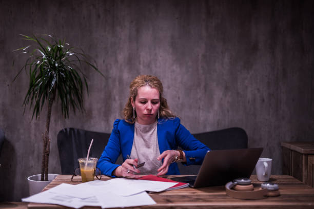 istock Busy female in modern office. 1247288208