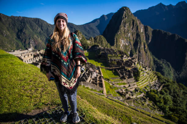 istock Blonde woman in Machu picchu 1247292411