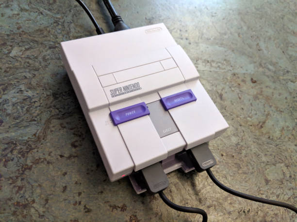 super nintendo classic in uso - snes foto e immagini stock