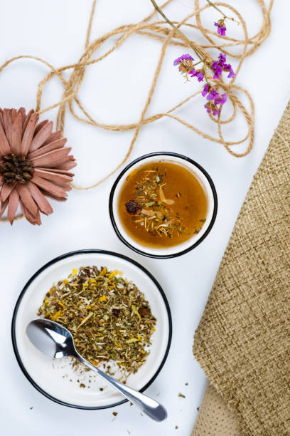 istock A cup of herbal tea with various herbs. 1247334334