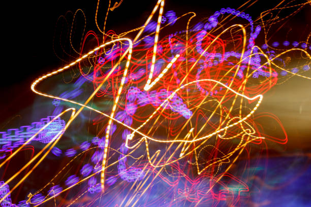 istock Colorful light strokes on a black background 1247363386