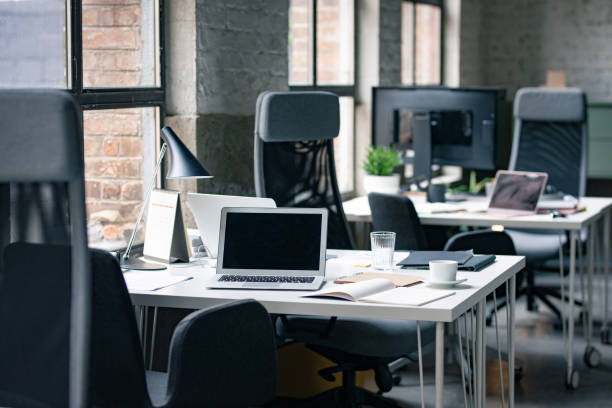 istock Modern Coworking Office With a Laptop pc 1247371903