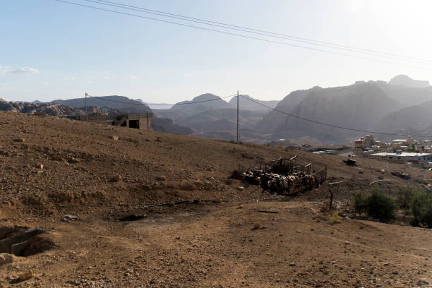 istock Sun is setting Distant mountains lit by the setting sun in Wadi Rum desert reservation, Jordan. 1247387213