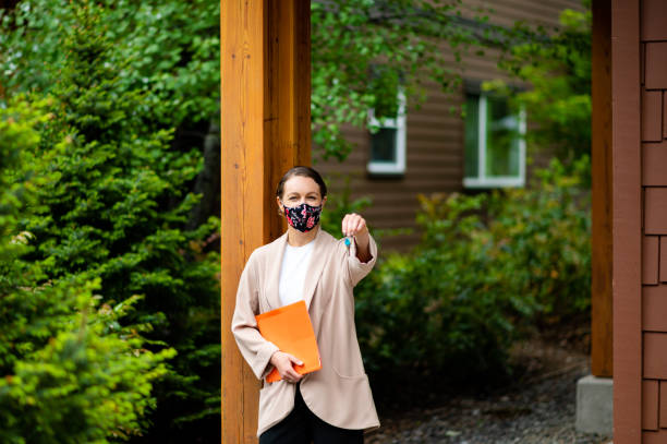 Real Estate Agent with a protective face mask