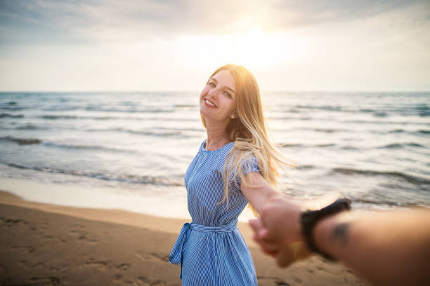 istock Making selfies at seaside at sunset 1247389079