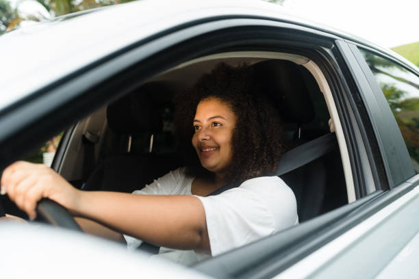 istock Woman driving car 1247418719
