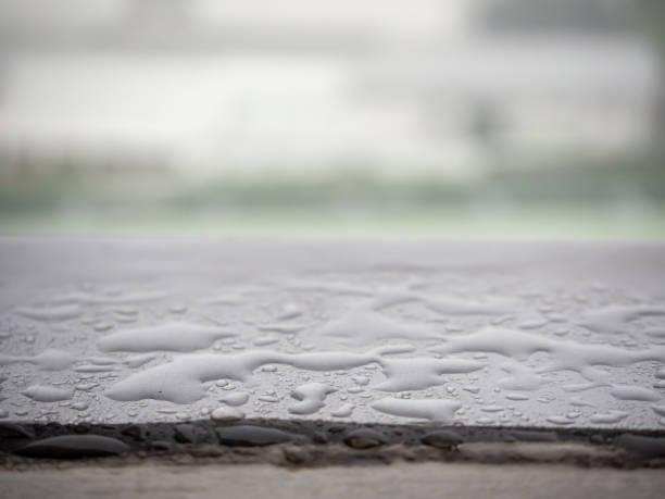 Droplets of water on the corridor edge that can be see after the rain with blur background