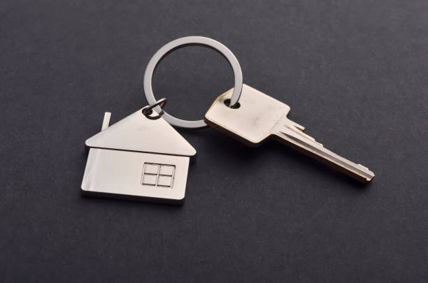 istock real estate concept home keychain. 1247486980