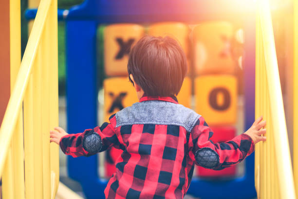 istock children play with playground 1247506937