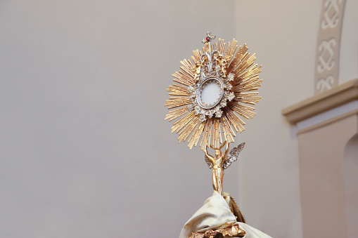 Ostensory for worship at a Catholic church ceremony - Adoration to the Blessed Sacrament - Catholic Church - Eucharistic Holy Hour - Holy Week