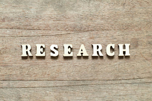 istock Letter block in word research on wood background 1247540980