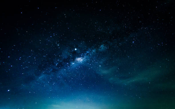 istock Milky way galaxy with stars and space in the universe background 1247568304