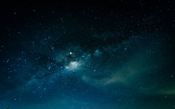 istock Milky way galaxy with stars and space in the universe background 1247571990