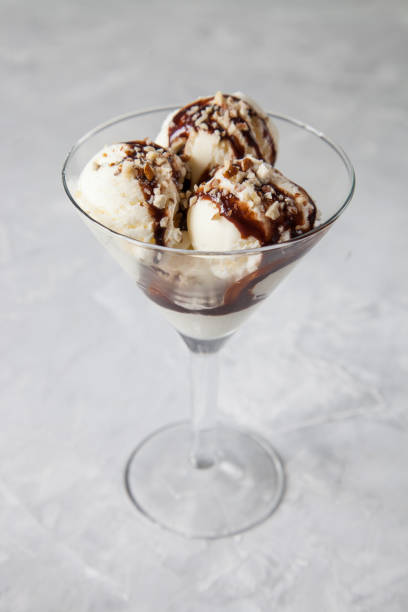 istock ice cream with chocolate syrup in an ice-cream bowl, selective focus 1247579764
