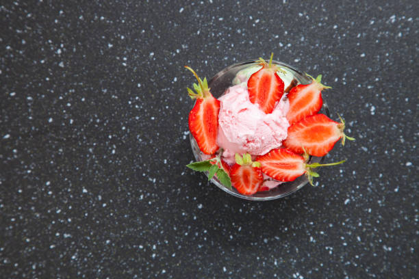 istock ice cream in a bowl on a table, selective focus 1247579798