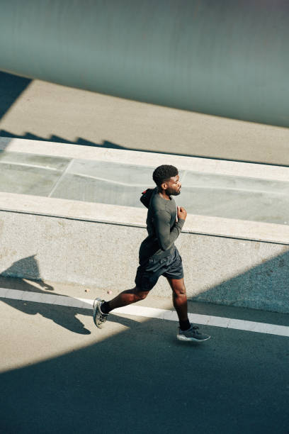istock Jogging young sportsman 1247604934