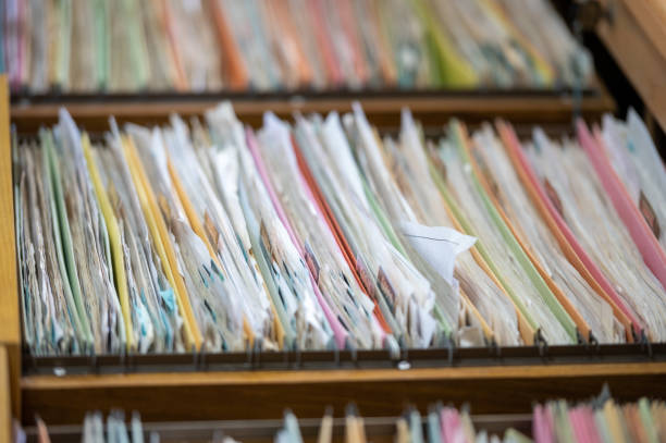 istock Financial and accounting documents are stored in a file cabinet. 1247634661
