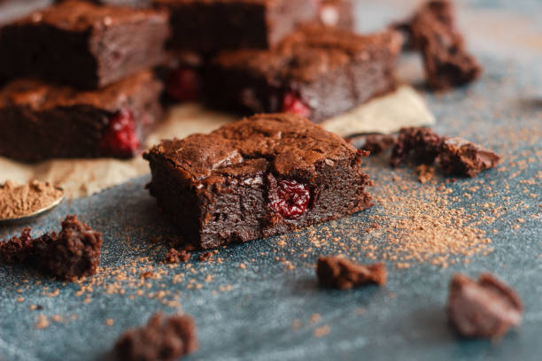 istock Tasty chocolate brownie with cherry 1247634700