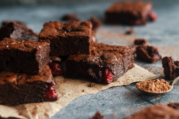 istock Tasty chocolate brownie with cherry 1247634705