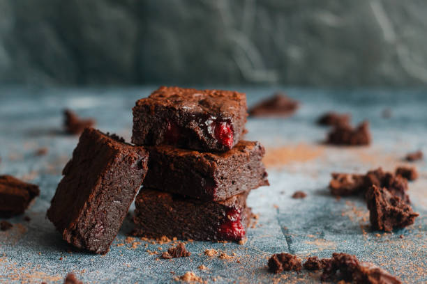istock Tasty chocolate brownie with cherry 1247634748