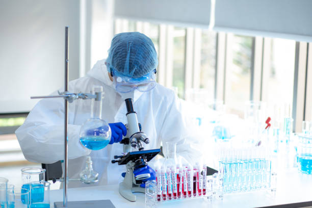 istock Researcher doing research for finding coronavirus, covid-19 vaccine 1247643400