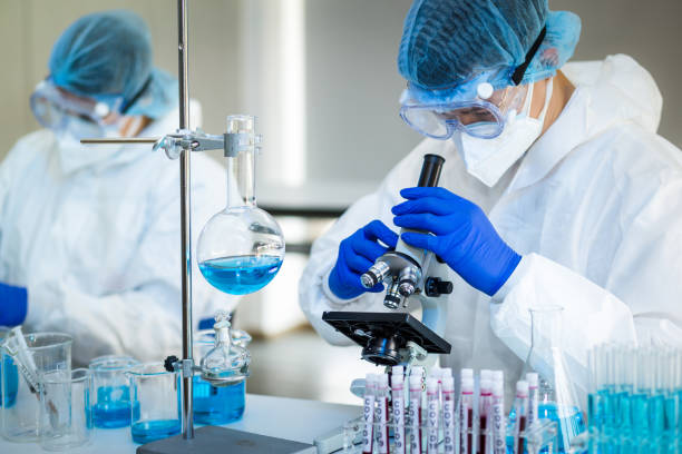 istock Scientists and researcher doing research for finding coronavirus, 1247644545