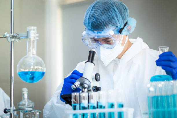 istock Scientist Working On Coronavirus Vaccine At Lab. 1247644569