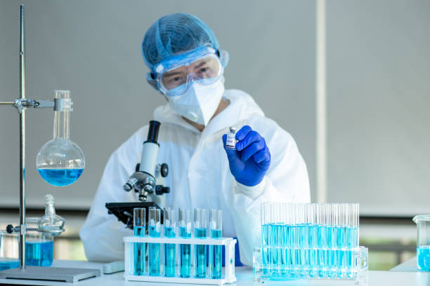 istock Scientist man Working On Coronavirus Vaccine At Lab. 1247644720