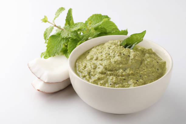 Mint coconut chutney Mint Chutney with fresh mint leaves coconut / Mint coconut chutney, selective focus chutney stock pictures, royalty-free photos & images